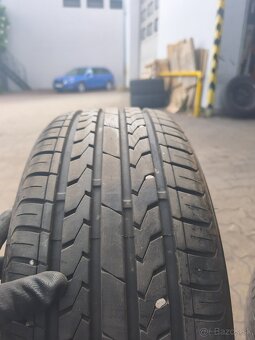 215/55R16 - 4