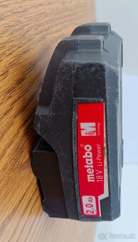 Nástenný držiak na organizáciu batérií Metabo CAS 18V - 4