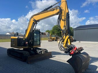 Caterpillar 310 - 4