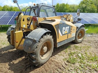 Caterpillar TH406 - 4