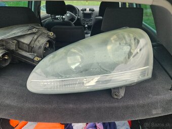 Originálne radio VW a predné halogénové svetla vw golf V - 4