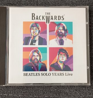 CD albumy Genesis, Elvenking, R.E.M., Springsteen, Backwards - 4