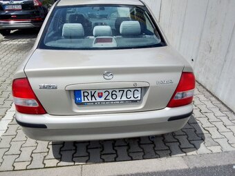 Mazda 323f-bj - 4