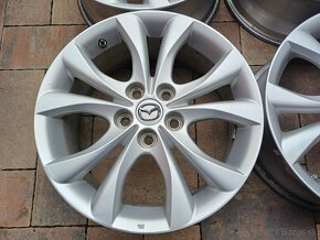 org.hlinikové disky Mazda---7Jx17-ET-52,5--5x114,3 - 4