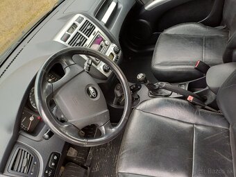 Kia Sportage 4x4  benzin - 4