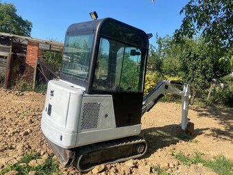 Mini bager Bobcat 320 - 4