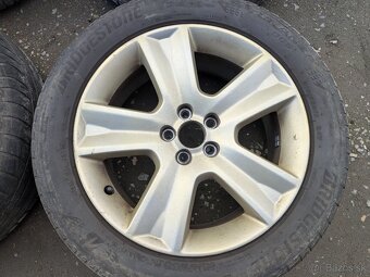 17" ALU kolesa Subaru 7Jx17 ET 48+pneu Bridgestone 215/55R1 - 4