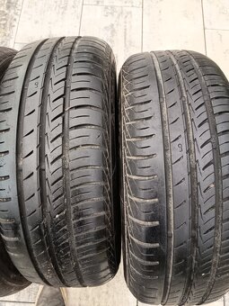 Letné na diskoch 185/60 R14 ,sada 4kusi - 4