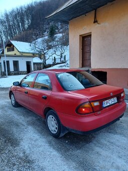Mazda 323i - 4