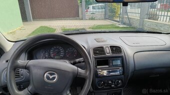 Mazda 323 - 4