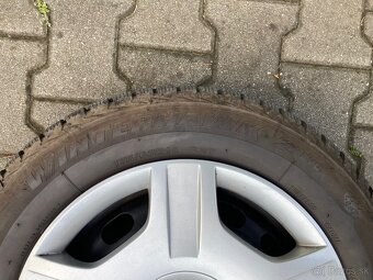 Predám sadu zimných kolies s puklicami na Ford Fiesta R14 - 4