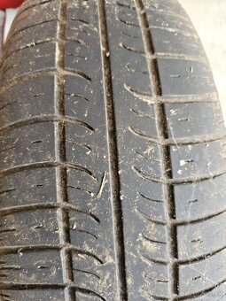 Plechové disky 14'' + letné pneu 165/70 R14
 - 4