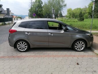 Kia carens - 4