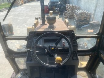 CAT 438B - 4