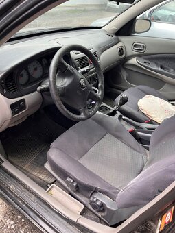 predam Nissan Almera - 4