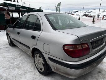 Nissan Almera 1.8 4D - 4