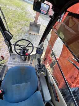 Kolesový báger Hitachi ZX210 - 4
