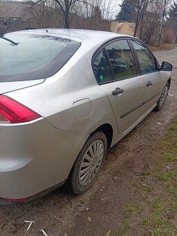 Renault laguna rok 2010 - 4