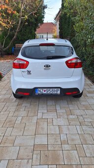 Kia rio - 4