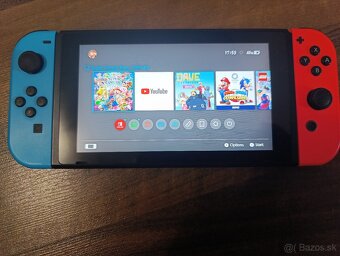 Použitý Nintendo Switch príslušenstvo + 2 hry - 4