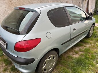 Peugeot 206 1,4i - 4