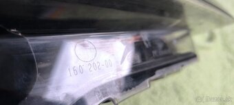 Opel Astra H xenon Hella - 4