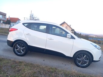 Hyundai Tucson ix35 ,1.6 benzin - 4