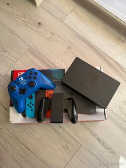 Nintendo Switch + 3 hry - 4