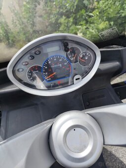 Kymco - 4