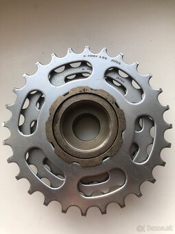 Suntour 7-kolečko 13-28z - 4