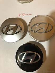Stredové krytky (pukličky) Hyundai - priemer 57,60 mm sivé/č - 4