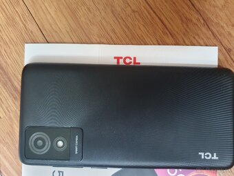 Mobil TCL 501 - 4