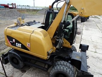CATERPILLAR M313D - kolové rýpadlo - 4