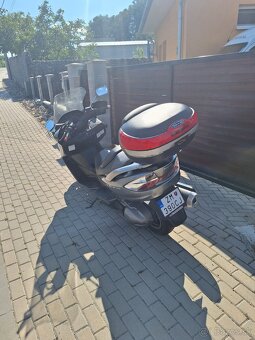 Suzuki burgman - 4