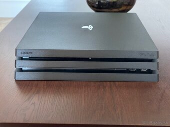 :) PS4 Pro 1Tb + 14 Spiele + 2. DualSCHOCKs - 4