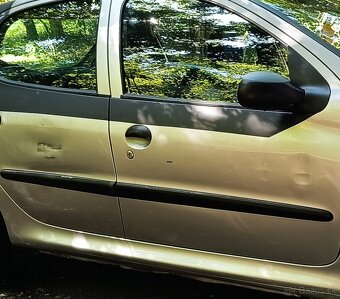 Peugeot 206 1.4i - 4