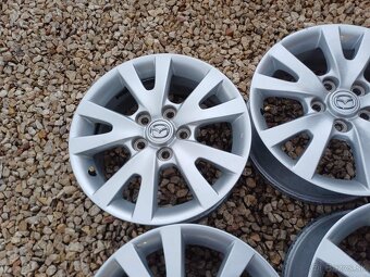 Orig.hlinikove disky Mazda - 3,5,6-6 1/2Jx16-ET-52,5-5x114,3 - 4