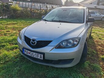Mazda 3 1.4 benzín  62kw - 4