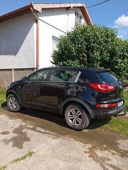 Kia Sportage - 4