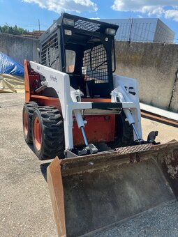 Šmykom riadeny nakladač Kubota Trak 1000 - 4