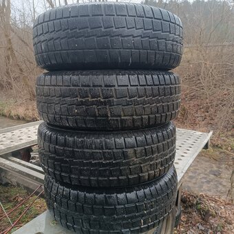 235/75 R15 - 4
