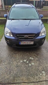 Kia Carens - 4
