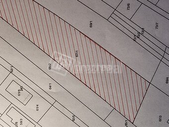 Rovinatý pozemok s možnosťou výstavby RD - 4