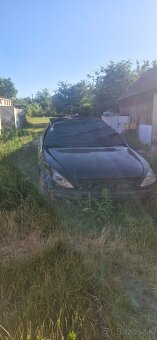Peugeot 607 a Kia rio - 4