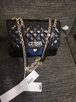 Guess - 4