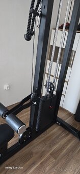 Posilnovaci stroj,horna a spodna kladka - 4