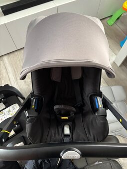 Autosedačka Doona+ s integrovaným podvozkom, isofixom - 4