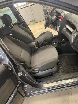 KIA Sportage - 4