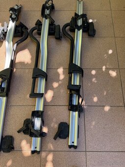 Thule WingBar Evo a 4x Thule Pro Ride 598 - 4