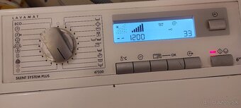 práčka AEG L47330 zhora plnená - 4